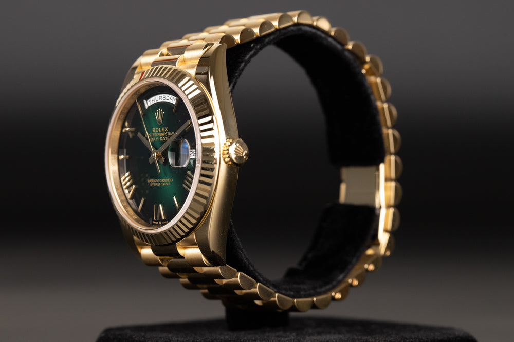 Rolex<br>228238 DayDate 40 Green Hombre Roman Numeral Dial