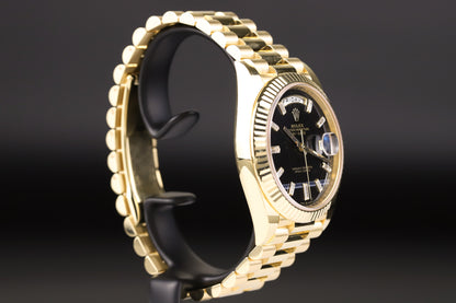 Rolex 228238 DayDate 40 Baguette Diamond Black Onyx Dial