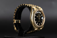 Rolex<br>228238 DayDate 40 Black Index Dial