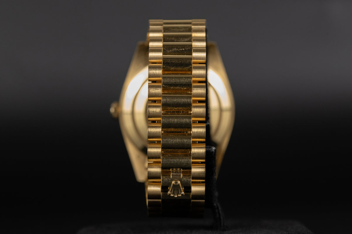 Rolex<br>228238 DayDate 40 Black Index Dial