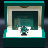 Rolex<br>124300 Oyster Perpetual 41mm Green Dial