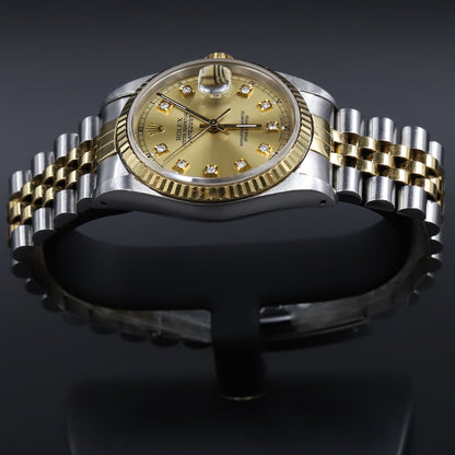 Rolex<br>16233 Datejust 36 SS/18k Champagne Diamond Dial