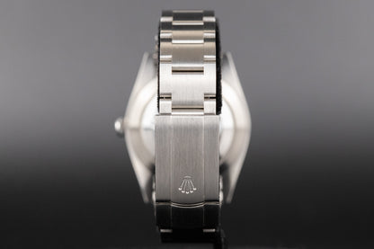 Rolex<br>124300 Oyster Perpetual 41mm Green Dial